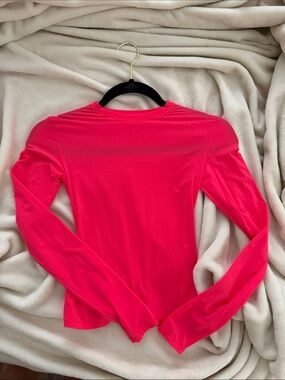 SKIMS Long Sleeve Bodysuit in Hot Pink